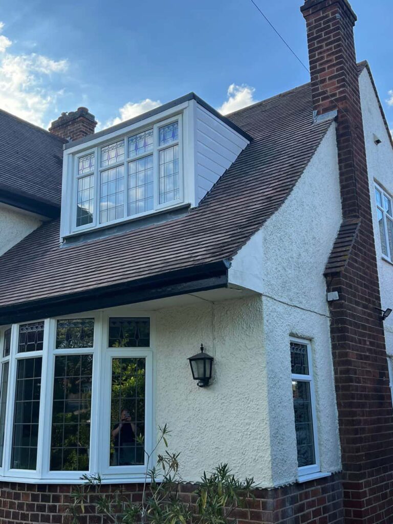 This is a photo of a dormer window which has just had some repairs carried out where the roof and the dormer meet. Works carried out by TRP Roofing South Cave
